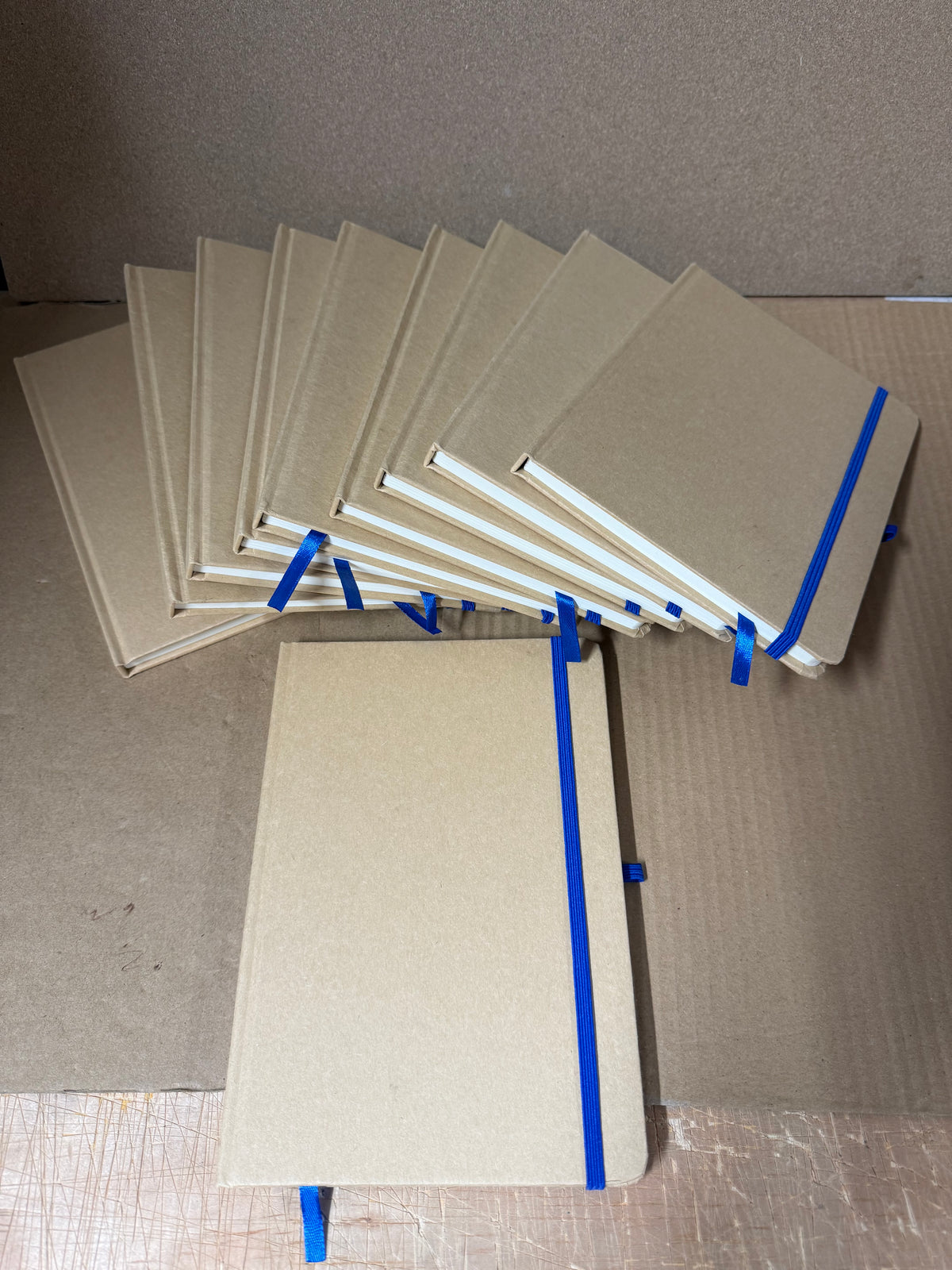Bundle of 10x A5 hardback notebooks with coloured closure